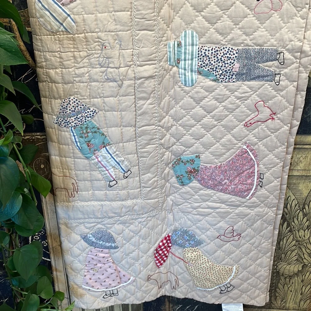 Appliqued and embroidered quilt